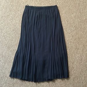 Navy pleated skirt.